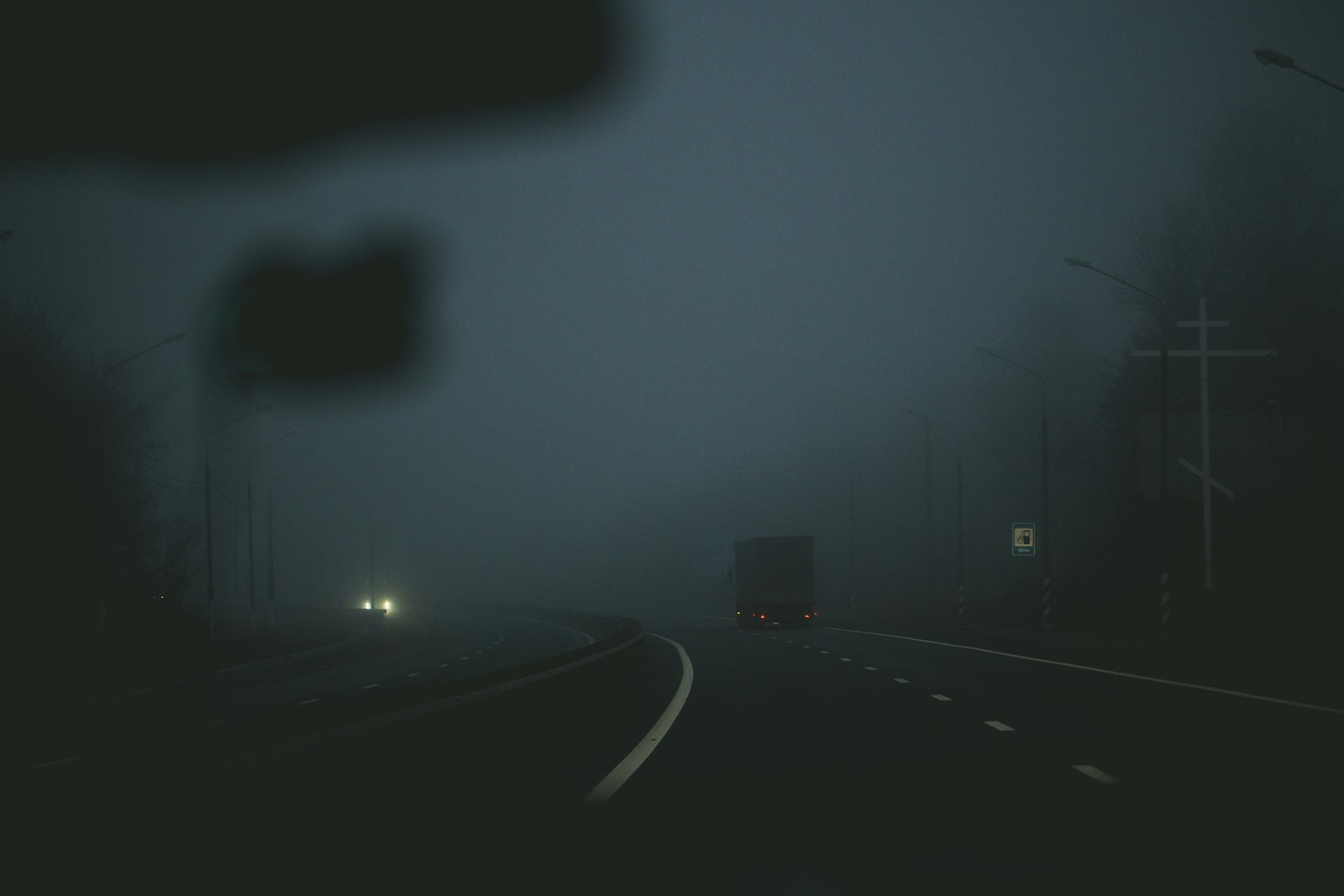 Box truck traveling at night