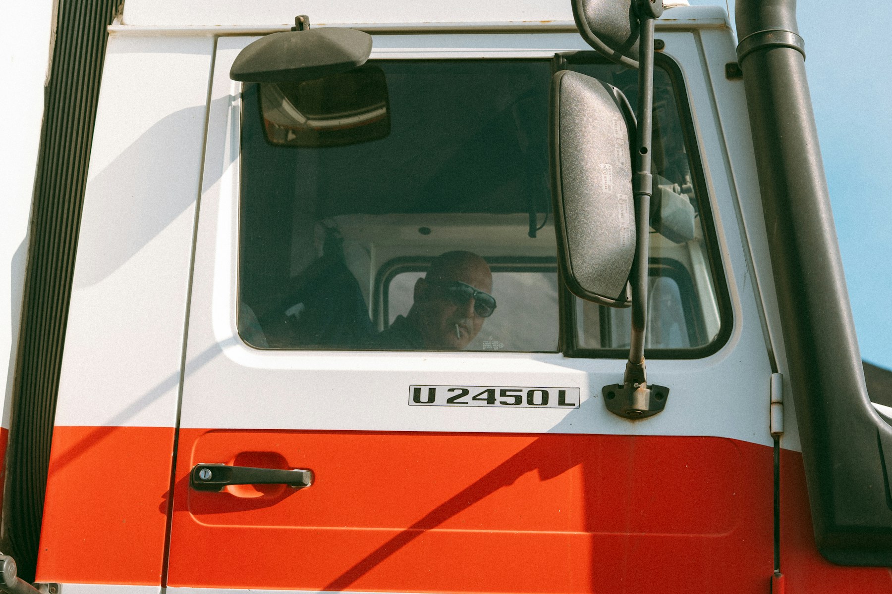 Professional truck driver inside the cab
