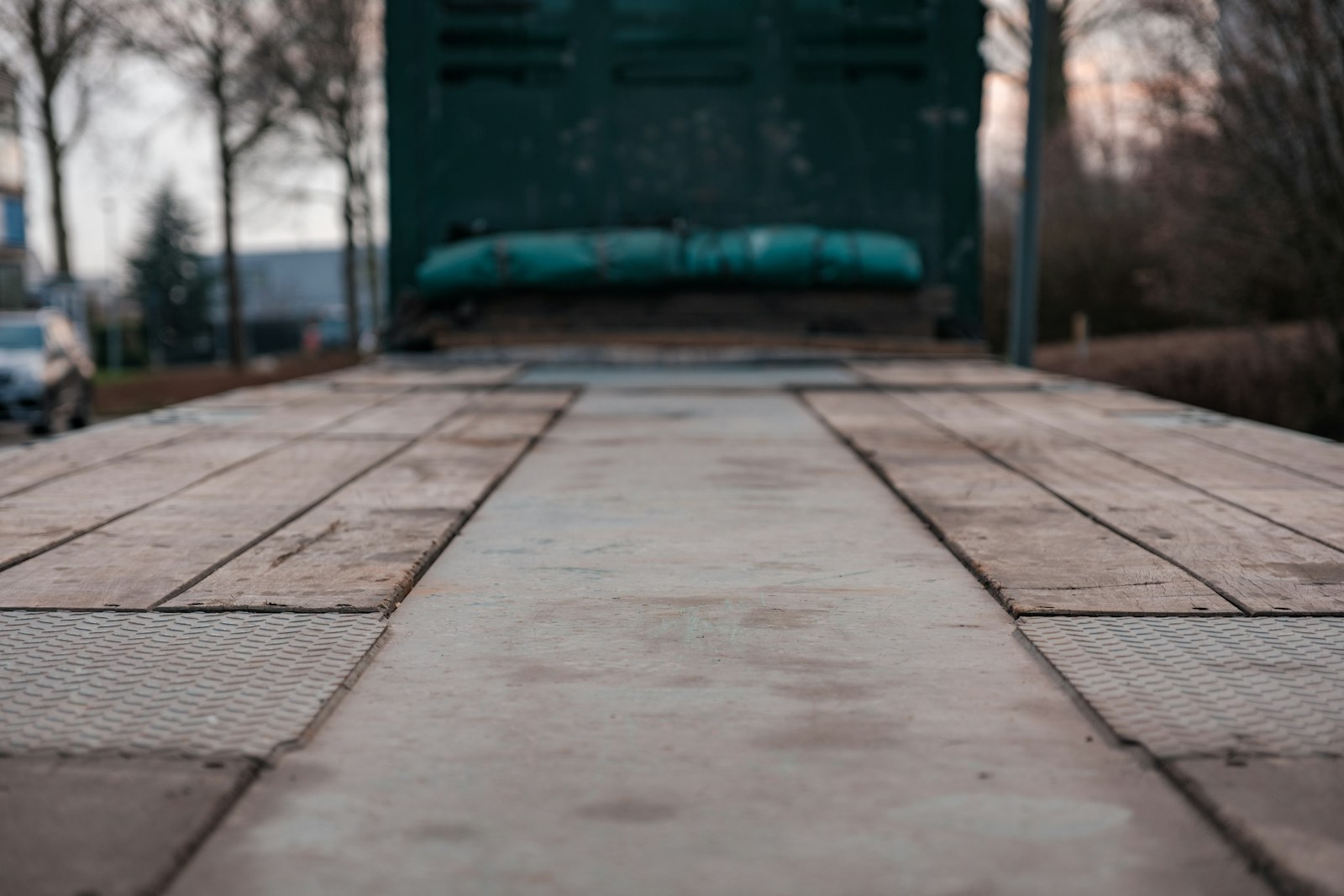 Flatbed trailer traveling on the road
