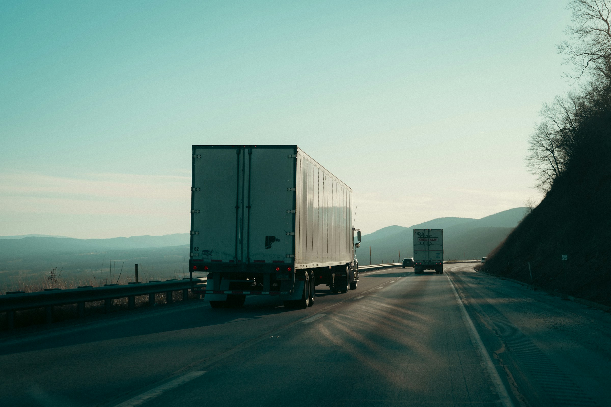 Dry van semi truck on a highway